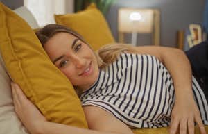 fancy sleep woman laying in bed about to go to sleep