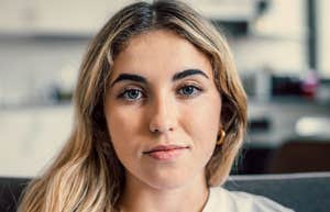 serious millennial woman thinking about how her parents raised her