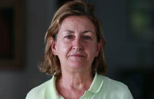 older woman serious about not tolerating anyone's nonsense