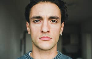 upset man after realizing people are pretending to like him
