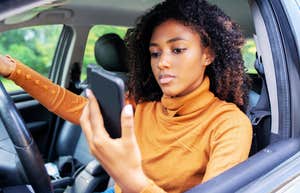 Person distracted on their phone. 