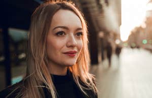 happy woman thinking about her good life