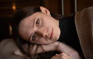 People Raised By Gen Z Parents Will Probably Struggle With These Things Later In Life serious woman raised by gen z parents struggling