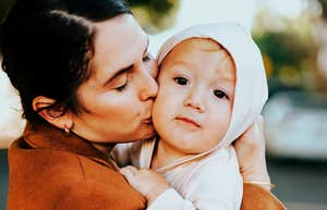 Child that feels safe and happy with parent.