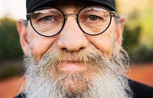 Aged man, making sense of contradictions in life.