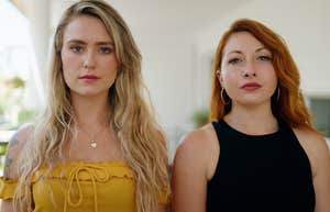 two new friends unsure of each other standing side by side