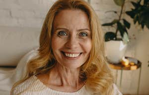 happy older woman smiling at home