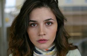 millennial woman looking frustrated about modern problems