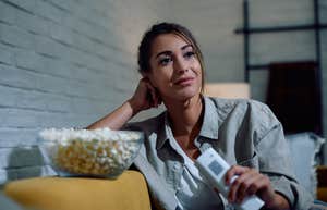 Things Movies Have Tried To Convince Us Are Normal Even Though They’re Not woman watching a movie