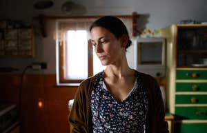 tired hardworking mom in home