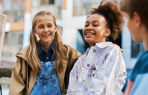 group of young kids laughing outside