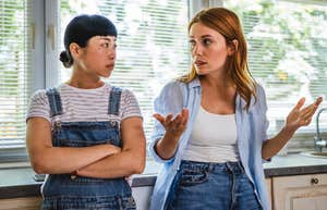 bride arguing with her friend about her destination wedding