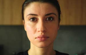 cold-hearted woman staring blankly