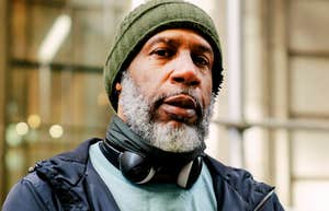 A portrait of a mature man outdoors in winter clothing, representing the 'functional loneliness' and the specific personality traits that prevent deep male bonding.