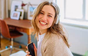 woman who prefers comfort over dressing up and being fancy relaxing at home with music