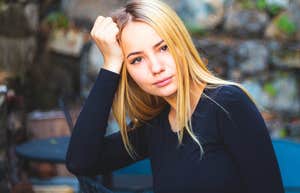 authentic woman feeling annoyed by fake people