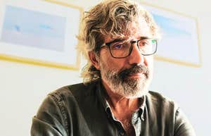 A pensive older man looking discouraged; a visual representation of the 'missed numbers' and economic realities that a CFO warns could make retiring at sixty-five a mistake.