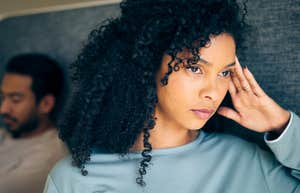 sad woman noticing signs her husband is cheating