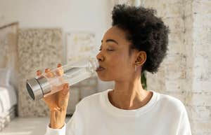 woman asks house cleaner discount used sink fill water bottle