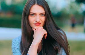 woman who is exceptionally hard to manipulate listening to phrases she knows are not ok