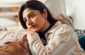 sad depressed woman mourning the loss of a close loved one