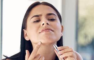 Woman finds aggressive chin hair.
