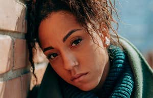 Woman shows signs of depression.