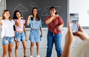 teacher filming her students to post online