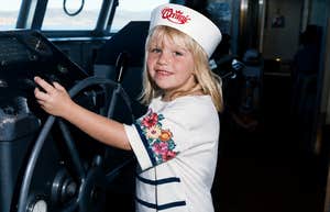 The author at age 7, captured in a moment of childhood joy; illustrating the young age at which the author experienced a life-threatening pharmaceutical reaction as discussed in the accompanying article.