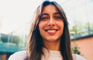 intelligent woman who thinks ahead smiling to herself