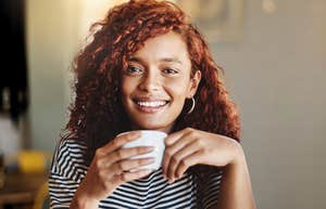 woman whose parents did an outstanding job raising her sipping coffee 