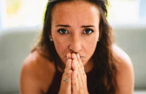 sad woman thinking deeply about her lonely childhood