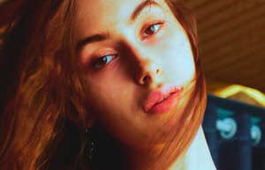 sad woman who had a hostile mom growing up