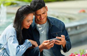 couple using phone together