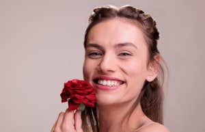 woman holding flower