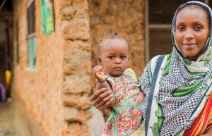 woman holding baby
