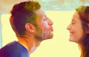 man and woman about to kiss