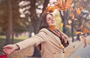 woman enjoying fall weather