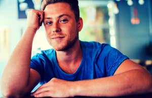 handsome young man thinking about relationship struggles