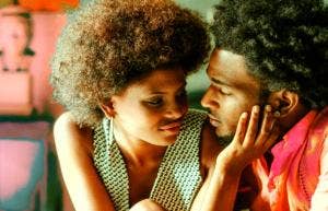 two people huddling together