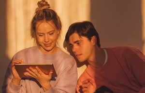 Couple looking at a tablet