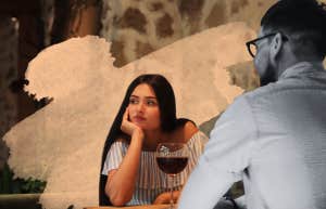 Woman coming to realization while at dinner
