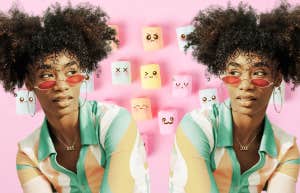 Woman with 'blinders' glasses on surrounded by different emotions