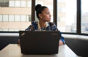 woman sitting in front of computer 
