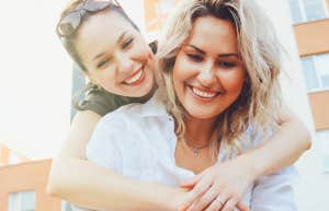 I'm Estranged From My Sister After She Stole My Identity And Lied About Being Pregnant sisters hugging