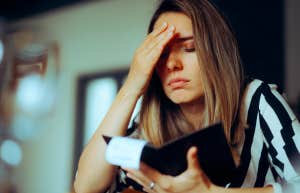 Former Server Explains Why She Refused To Tip After Bad Dining Experience unhappy woman seeing restaurant bill