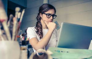 Gen Z-er In Their First Internship Can't 'Fathom' Working For The Rest Of Their Life woman working on computer