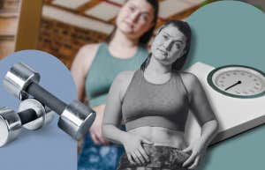 Woman examining her waist 