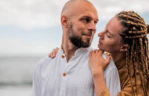 woman hugging man from behind