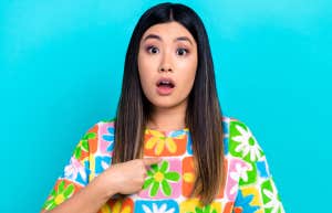 dissatisfied unhappy woman direct pointed finger at herself confused open mouth blamed 